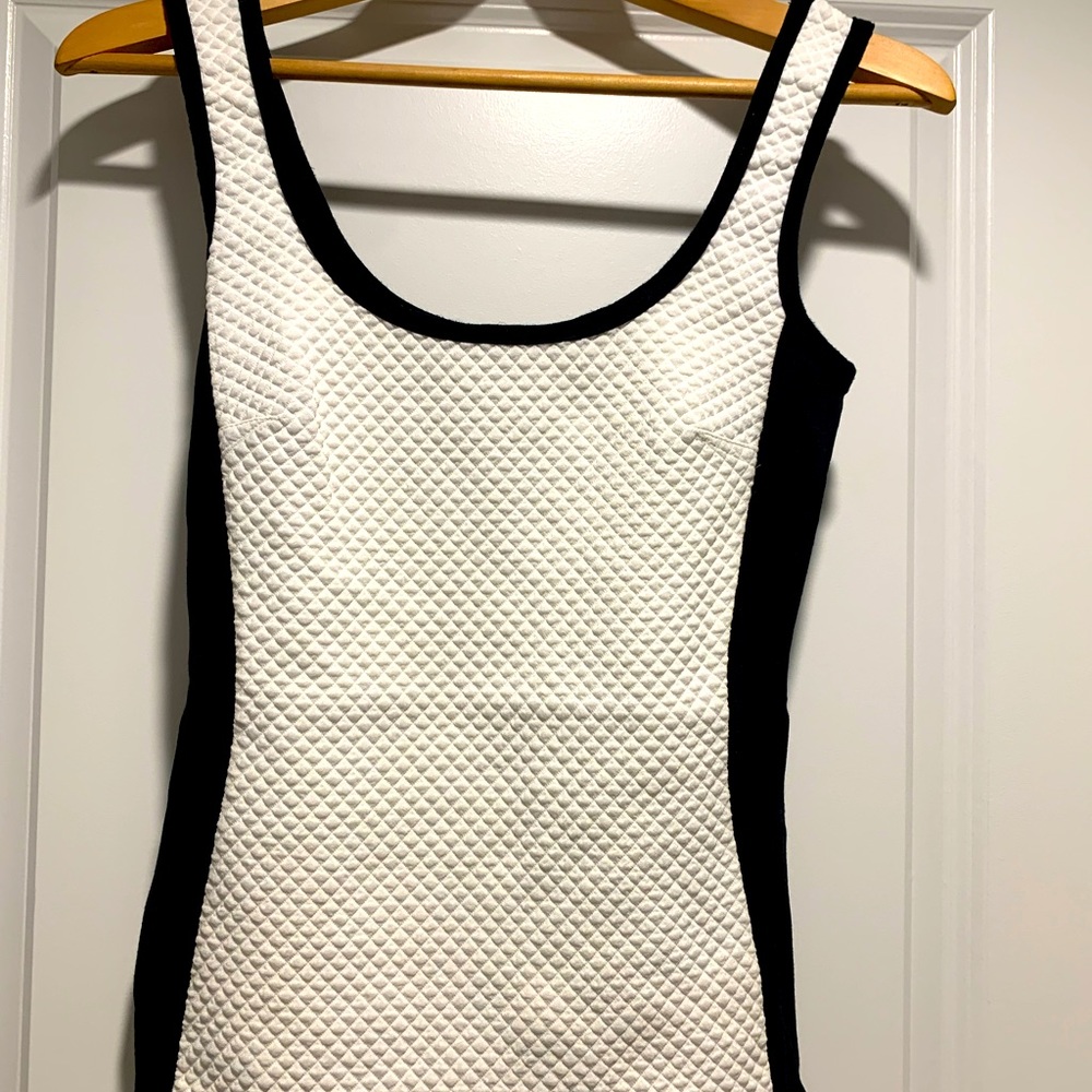 Two-tone black/off-white tank
